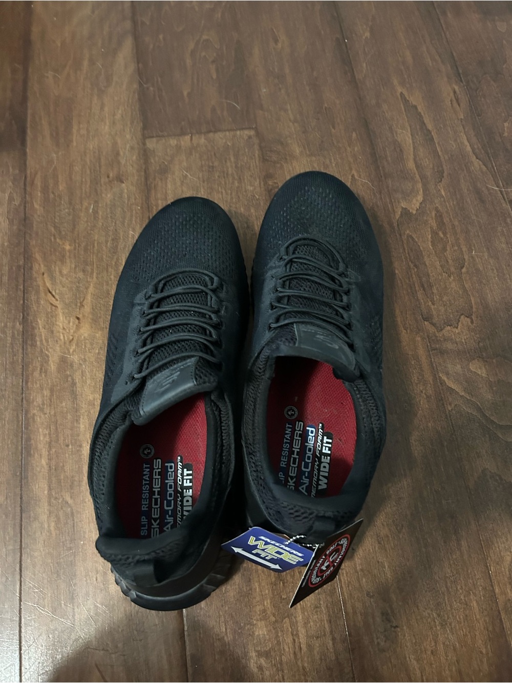 Skechers Men’s Black Athletic Slip-On Sneakers with Red Insole